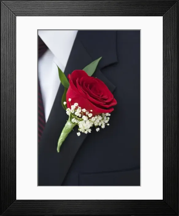 Framed Print : USA, close-up of boutonniere on grooms lapel, wedding detail