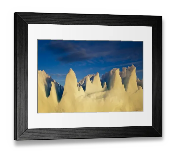 Framed Print : Greenland, Ilulissat, Setting midnight sun lights jagged floating iceberg near Eqip
