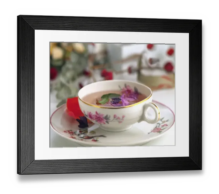 Framed Print : Tea cup with flowers and herbs Framed Print : Tea cup with flowers and herbs