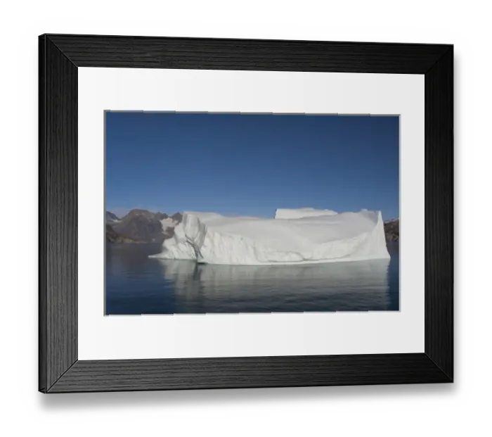 Framed Print : Greenland, Southeast coast, Skjoldungen Fjord. Large iceberg in scenic fjord surrounded Framed Print : Greenland, Southeast coast, Skjoldungen Fjord. Large iceberg in scenic fjord surrounded
