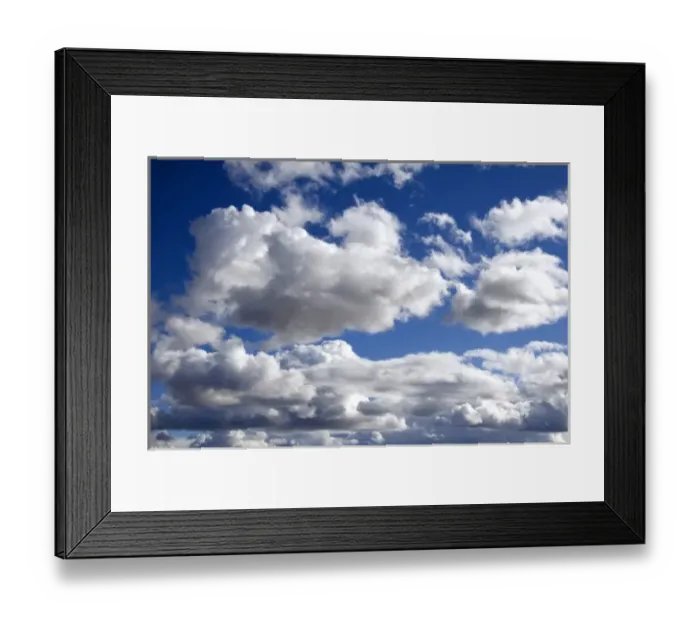 Framed Print : Cumulus clouds against a blue sky Framed Print : Cumulus clouds against a blue sky