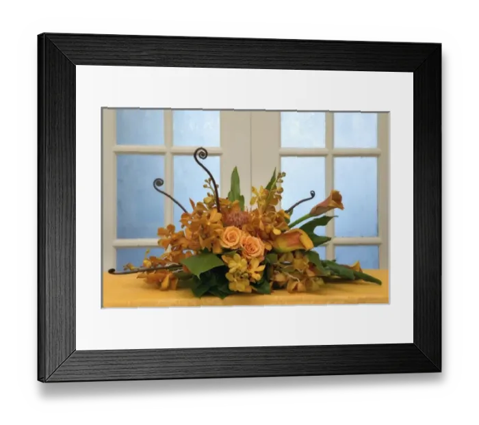 Framed Print : Colorful flower arrangement on table in front of door Framed Print : Colorful flower arrangement on table in front of door