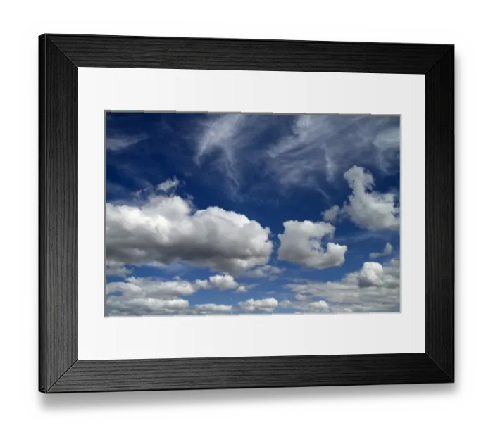 Framed Print : Cumulus and cirrus clouds with blue sky over Idaho, USA