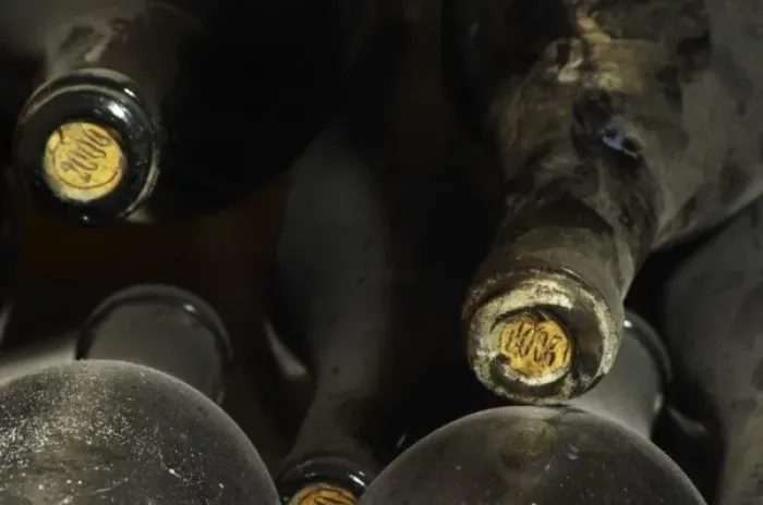 Framed Print : 2000 stamped on the cork on old dusty bottles. Domaine Cazeneuve in Lauret. Pic St Loup Framed Print : 2000 stamped on the cork on old dusty bottles. Domaine Cazeneuve in Lauret. Pic St Loup