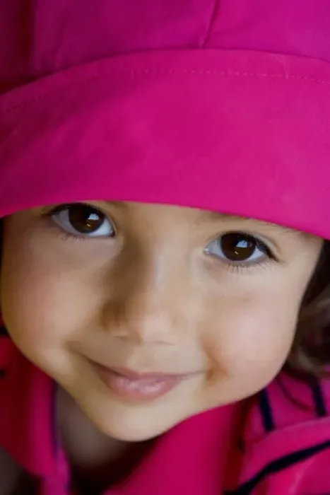 Framed Print : 4 year old girl wearing pink and smiling at the camera (MR) Framed Print : 4 year old girl wearing pink and smiling at the camera (MR)