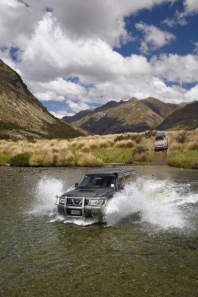 4WD crossing the Mararoa River, near Mavora Lakes, Southland, South Island, New Zealand