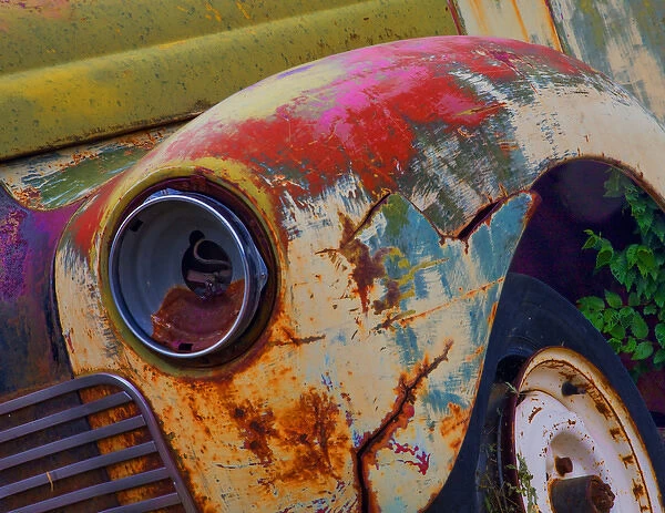 Detail of an abandoned Chevrolet truck headlight