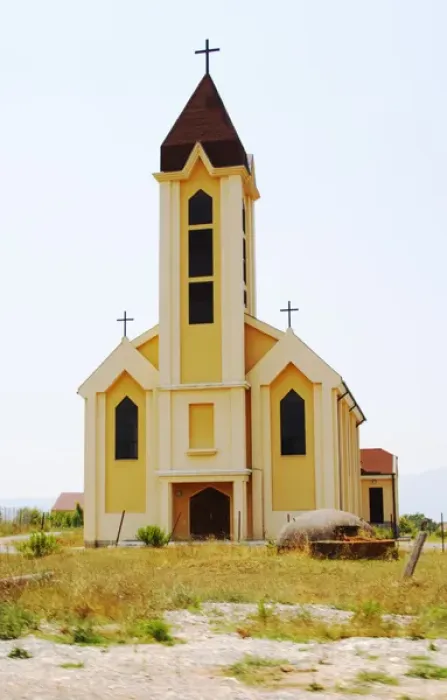 Framed Print : An abandoned church in the countryside. In font of the church a typical Albanian