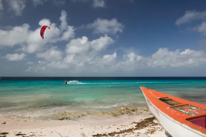 Framed Print : ABC Islands - BONAIRE - Pink Beach: Beach View with Fishing Boat & Kite Surfer Framed Print : ABC Islands - BONAIRE - Pink Beach: Beach View with Fishing Boat & Kite Surfer