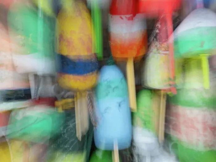 Framed Print : Abstract blur of floats for lobster traps
