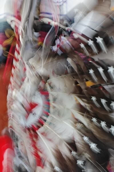 Abstract motion view of colorfully dressed Native American Indian dance, Montana