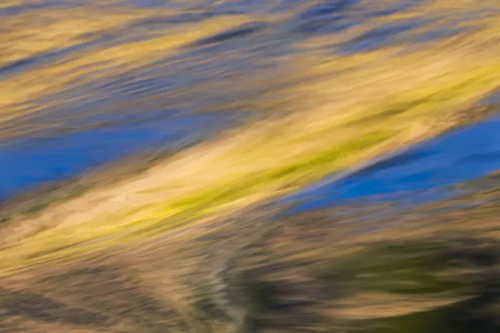 Framed Print : Abstract reflection of blue sky and autumn gold on flowing water, Canary Spring