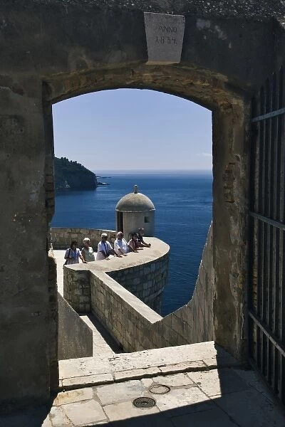 Adriatic Sea framed by gate on city wall around Old Town Dubrovnik, UNESCO World