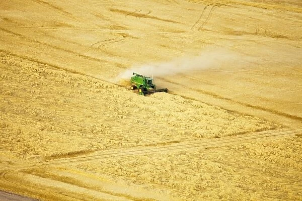 Aerial of combines harvesting wheat crop in the Palouse Region near Pullman, Washington