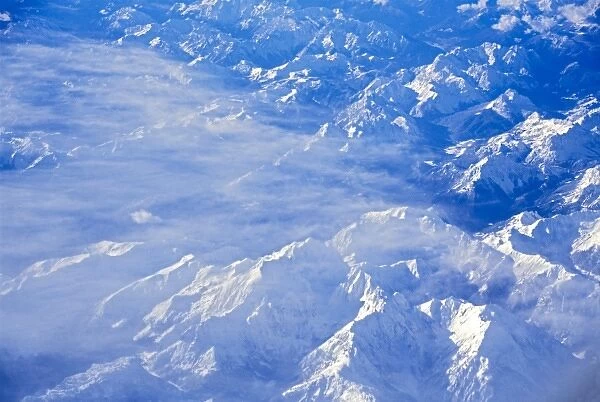 Aerial image of snow covered North Cascades mountains; Pacific Northwest, U. S. A