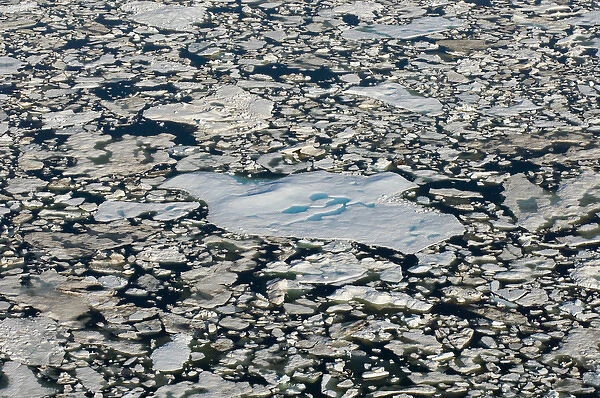 aerial of multi-layer ice (freshwater pans formed over the years where the salt is