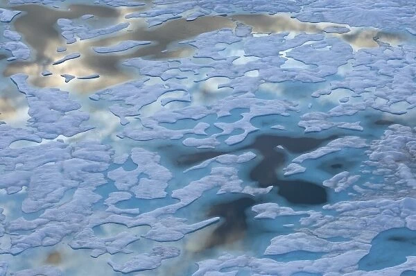 Aerial of multi-layer ice during summer evening, off National Petroleum Reserves
