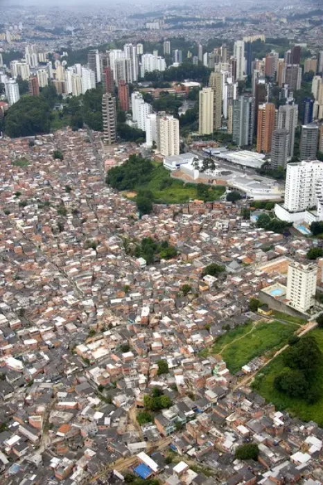 Framed Print : Aerial view of crowded favela housing contrasts with modern apartment buildings in Sao Paulo Framed Print : Aerial view of crowded favela housing contrasts with modern apartment buildings in Sao Paulo