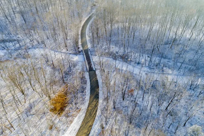 Framed Print : Aerial view of forest and road after snowfall in winter Stephen A Framed Print : Aerial view of forest and road after snowfall in winter Stephen A