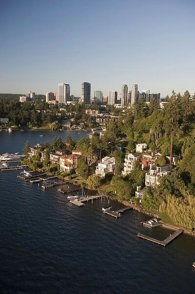 Aerial view of homes along the shore of Lake Washington and downtown Bellevue, Washington