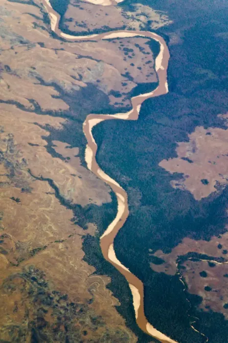 Framed Print : Aerial view of river flowing through land below, Madagascar Framed Print : Aerial view of river flowing through land below, Madagascar