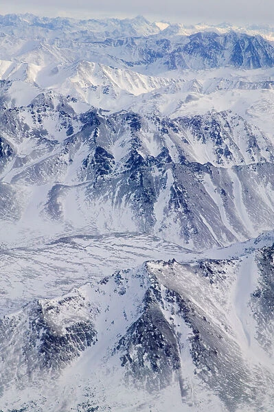 Aerial view of snow covered mountain range, Alaska, USA