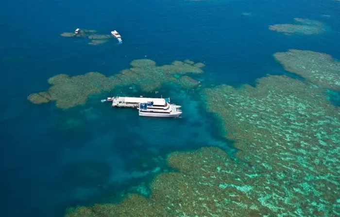 Framed Print : Aerial view of a tour boat docked at a pontoon at the Great Barrier Reef, Queensland Framed Print : Aerial view of a tour boat docked at a pontoon at the Great Barrier Reef, Queensland