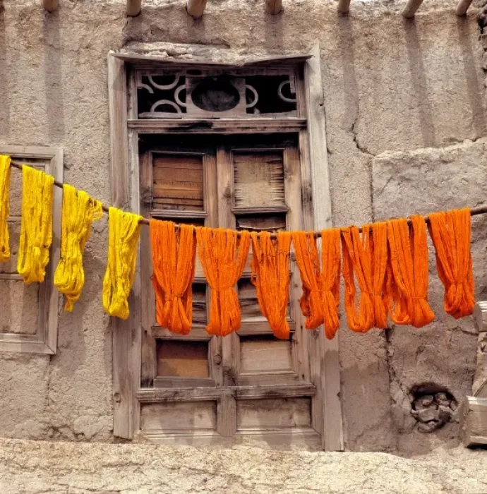 Framed Print : Afghanistan, Ghazni. Colorful woolen yarn dries on wooden poles in Ghazni in Afghanistan