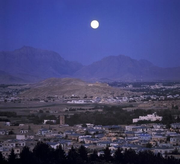 Afghanistan, Kabul. A full moon illuminates the sleeping city of Kabul, Afghanistans capital