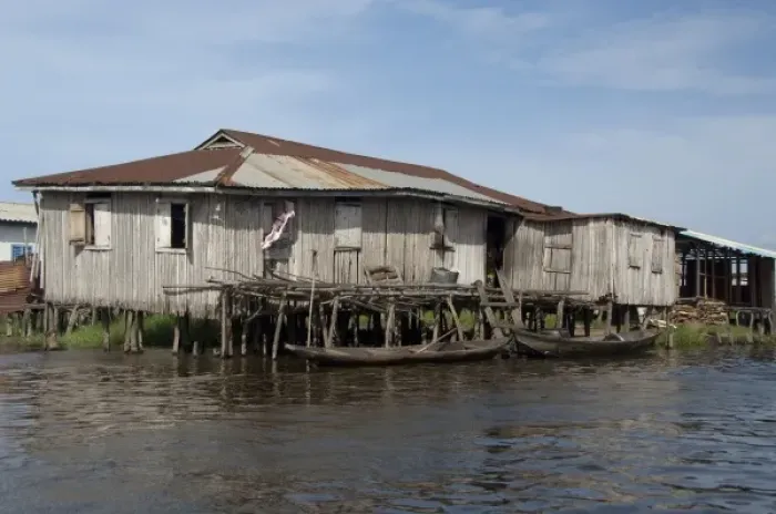 Framed Print : Africa, Benin, Ganvie. typical Tofinu village home on stilts over the waters of Lake Nokoue