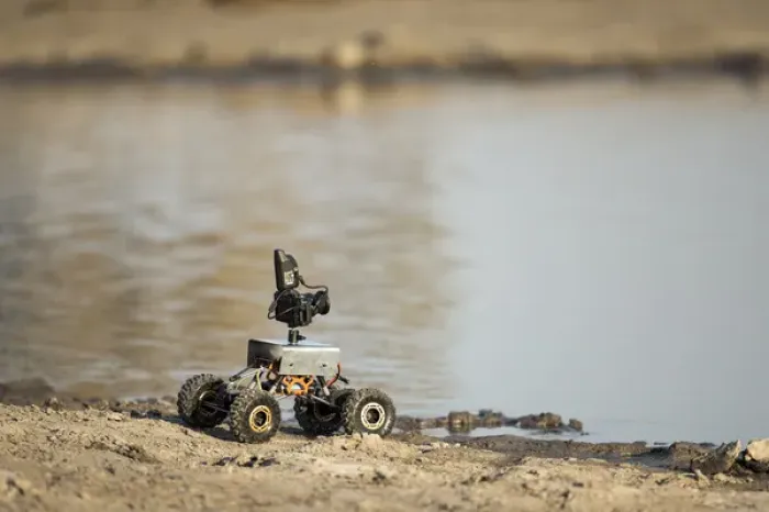 Framed Print : Africa, Botswana, Chobe National Park, Remote camera rover positioned by water hole Framed Print : Africa, Botswana, Chobe National Park, Remote camera rover positioned by water hole