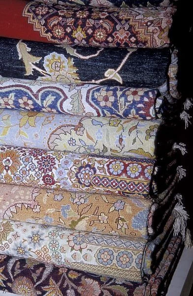 Africa, Egypt, Cairo. El Sultan carpet school - fine wool carpets folded inside out