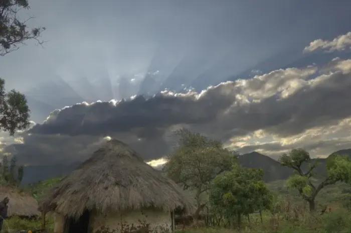Framed Print : Africa, Ethiopia, Regia region, Bargoba village. Streaks of sunlight stream from behind clouds Framed Print : Africa, Ethiopia, Regia region, Bargoba village. Streaks of sunlight stream from behind clouds