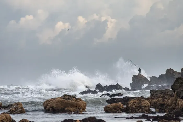 Framed Print : Africa, Morocco, Casablanca. Man fishing amid ocean waves Framed Print : Africa, Morocco, Casablanca. Man fishing amid ocean waves