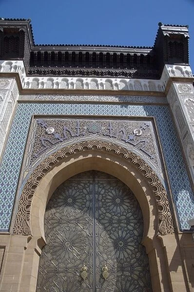 Africa, Morocco, Casablanca. Royal Palace entry, bronze door detail with ornate tile