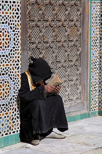 Africa, Morocco, Fes. Reading at the Al Attarine Madersa