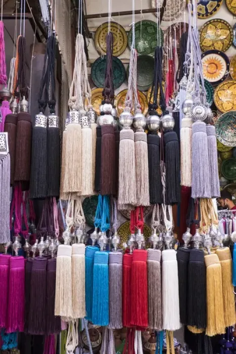 Framed Print : Africa, Morocco, Marrakech. Curtain tie-backs for sale at a market stall in the medina