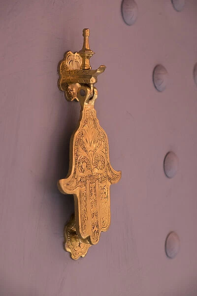 Africa, Morocco, Marrakech. A traditional door knocker, the hand of Fatima is said