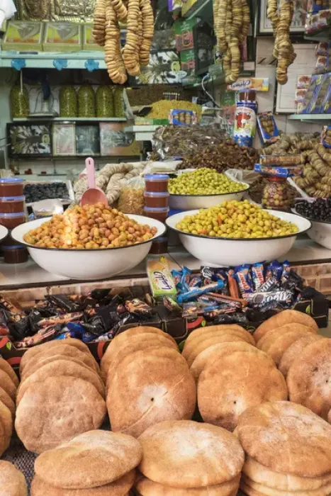 Framed Print : Africa, Morocco, Moulay Idriss. Market stall selling bread, olives, figs and other