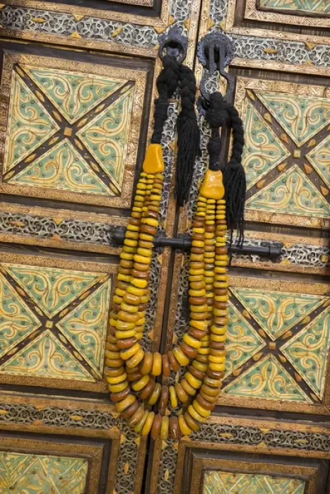Framed Print : Africa, Morocco, Tinerhir. Traditional necklace of Berber woman hangs on an ornate