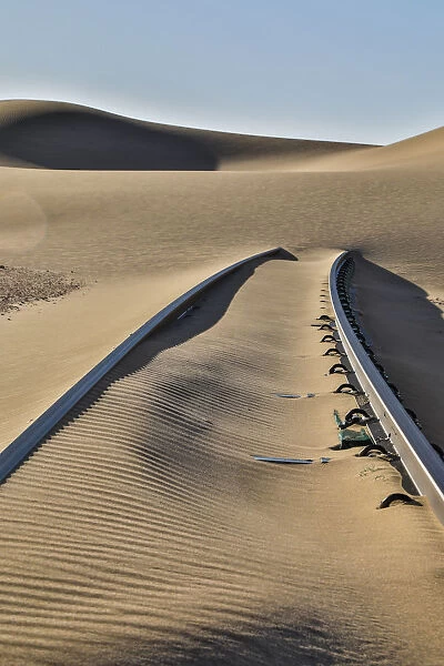 Africa, Namibia, Garub, Railroad Tracks and Drifted Sand
