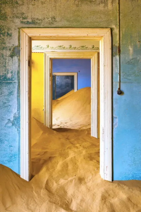 Framed Print : Africa, Namibia, Kolmanskop. Doorways and drifting sand in an abandoned diamond mining town Framed Print : Africa, Namibia, Kolmanskop. Doorways and drifting sand in an abandoned diamond mining town