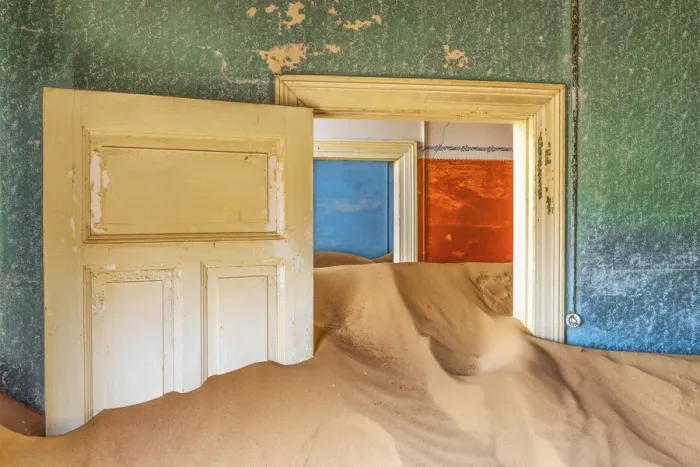 Framed Print : Africa, Namibia, Kolmanskop. Doorways and drifting sand in an abandoned diamond mining town Framed Print : Africa, Namibia, Kolmanskop. Doorways and drifting sand in an abandoned diamond mining town