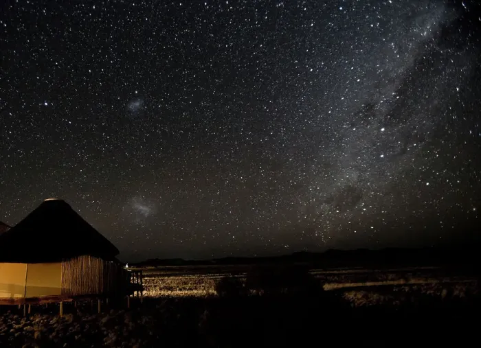 Framed Print : Africa, Namibia, Namib-Naukluft Park, Dune Lodge. Lodging hut, Magellanic Clouds, and Milky Way Framed Print : Africa, Namibia, Namib-Naukluft Park, Dune Lodge. Lodging hut, Magellanic Clouds, and Milky Way