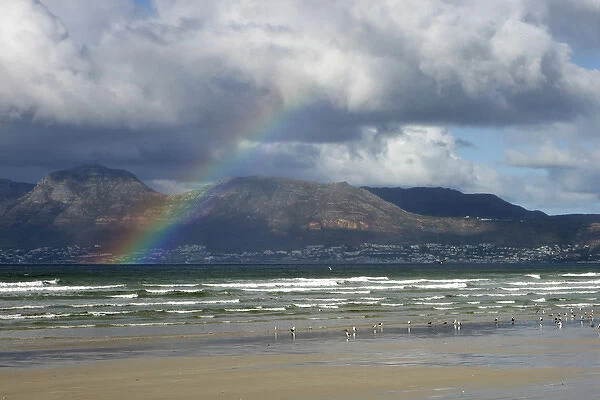 Africa, South Africa, Cape Town. Rainbow at Muizenberg Beach near Cape Town