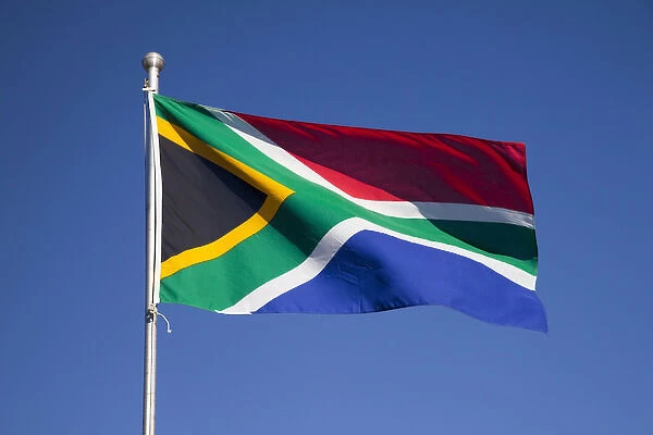 Africa, South Africa, Namaqua National Park. South African flag billows in breeze