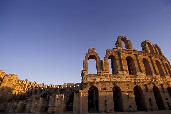 Africa, Tunisia, El Jem. Ruins of a Roman amphitheatre at sunset, built in 300 AD could seat 35