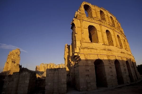 Africa, Tunisia, El Jem. Ruins of a Roman amphitheatre at sunset; built in 300 AD could seat 35