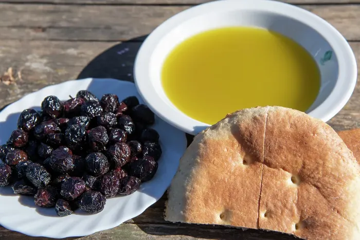 Framed Print : Africa, Tunisia, Zaghouan. Freshly harvested olives paired with olive oil and handmade bread Framed Print : Africa, Tunisia, Zaghouan. Freshly harvested olives paired with olive oil and handmade bread