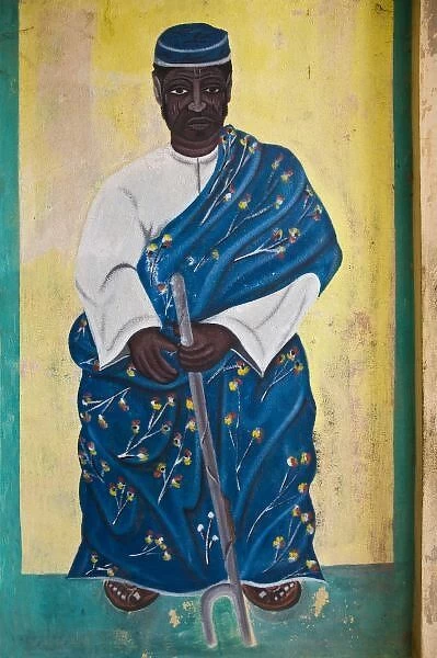 Africa, West Africa, Benin, Ouidah, Temple of the Pythons. Wall mural of man with
